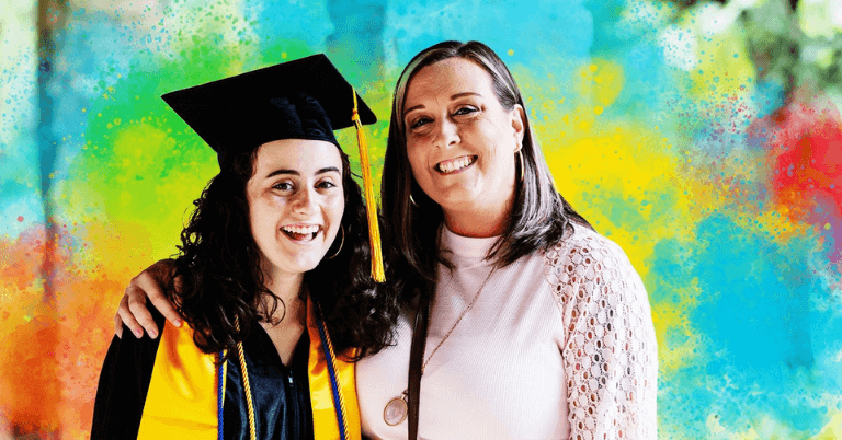 Image of a recent graduate smiling with a family member